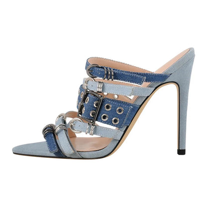 Denim high-heeled shoe with buckles on a white background, featuring the brand 'Only Maker'.