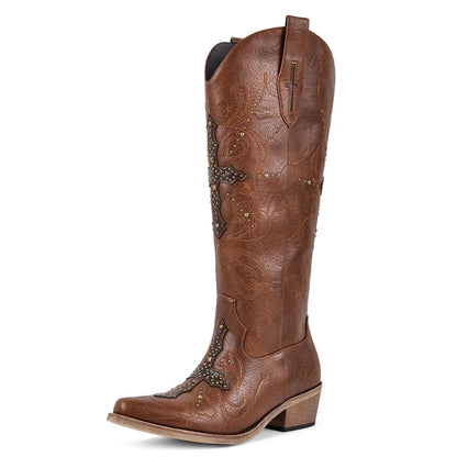 Brown cowboy boot with decorative elements on a white background
