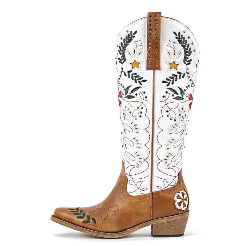 Brown and white cowboy boot with floral and star designs on a white background