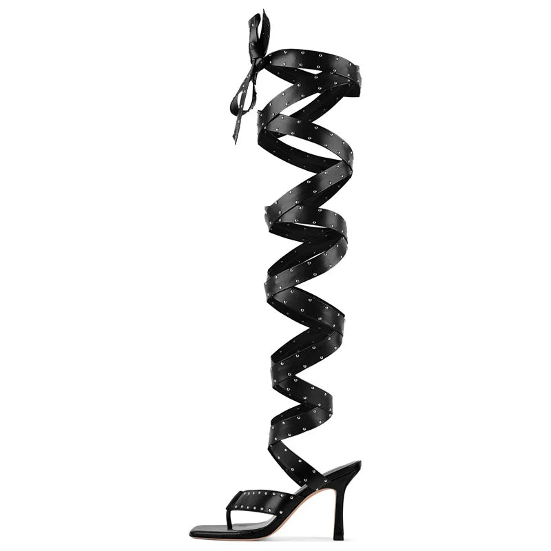 Black spiral high-heeled sandal on a white background