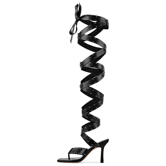 Black spiral high-heeled sandal on a white background