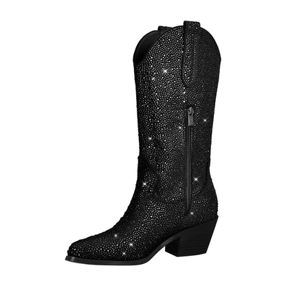 Black cowboy boot with rhinestone embellishments on a white background