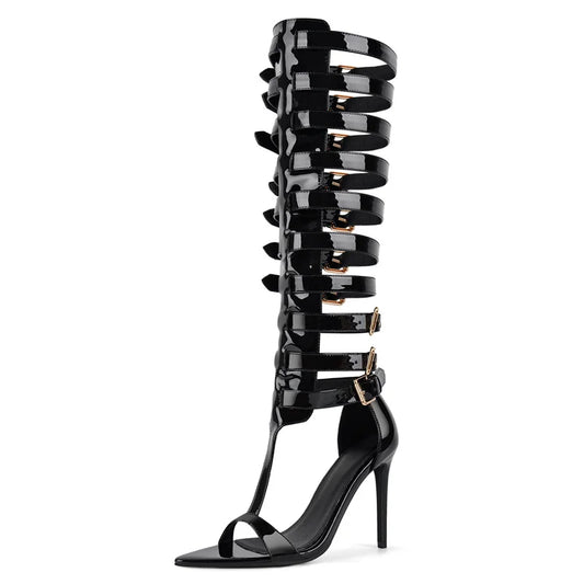 Black high-heeled sandals with multiple straps on a white background