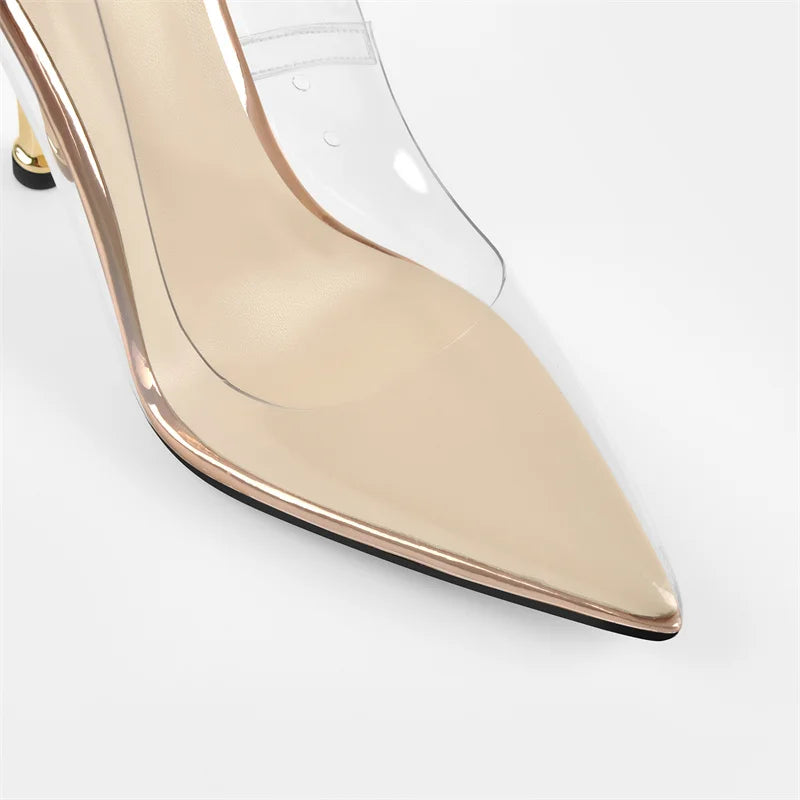 Gold high-heeled shoe on a white background