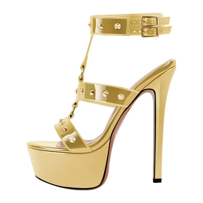 Gold high-heeled shoe with platform and straps on a white background