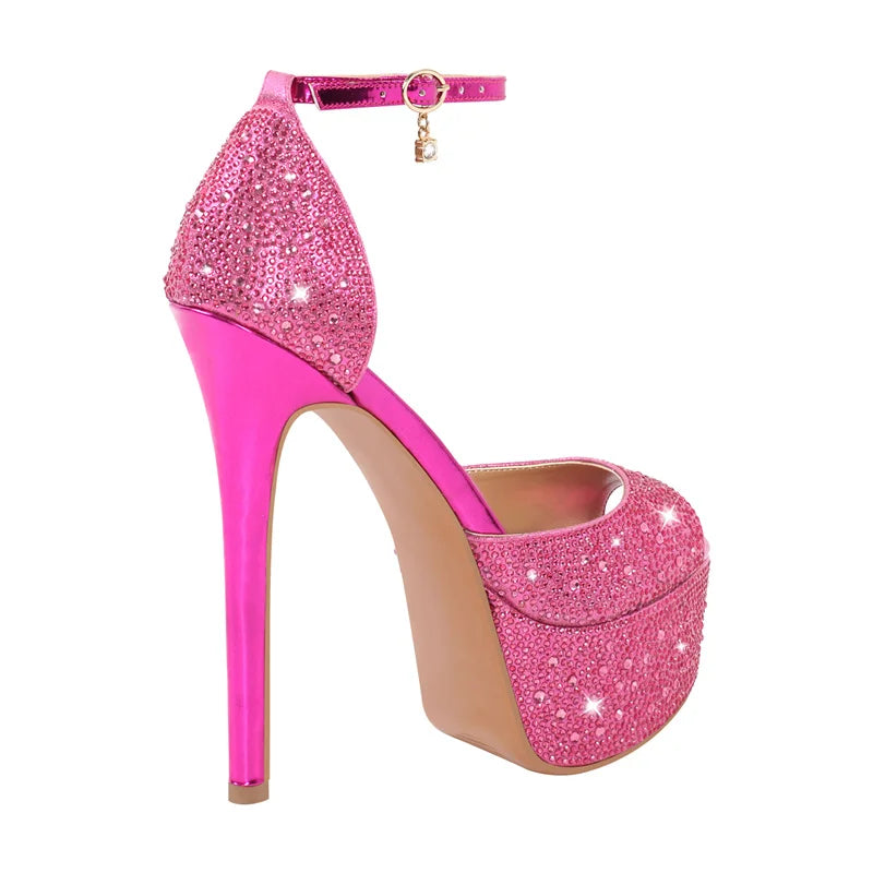 Pink high-heeled shoe with glittery platform on a white background
