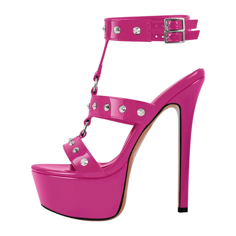 Pink high-heeled shoe with studded details on a white background
