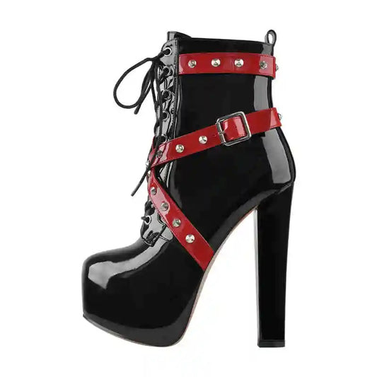 Black high-heeled boot with red straps and buckles on a white background