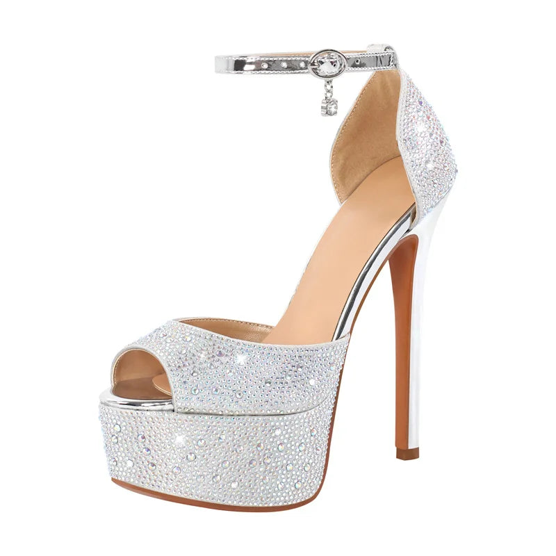 Silver high-heeled shoe with platform on a white background