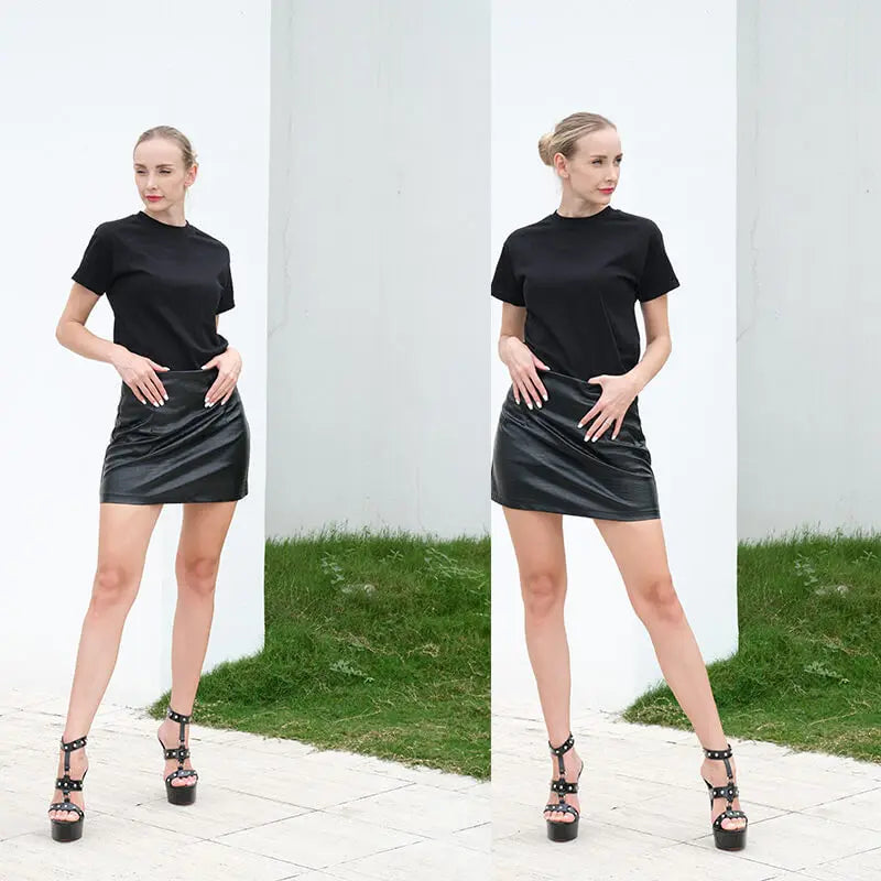 Woman wearing a black dress with a white background