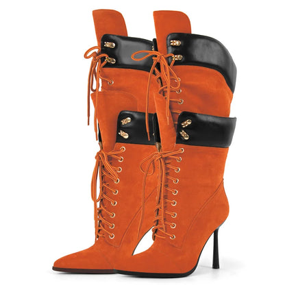 Orange high-heeled boots with black accents on a white background