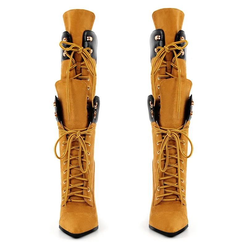 Pair of tan knee-high boots with black accents on a white background