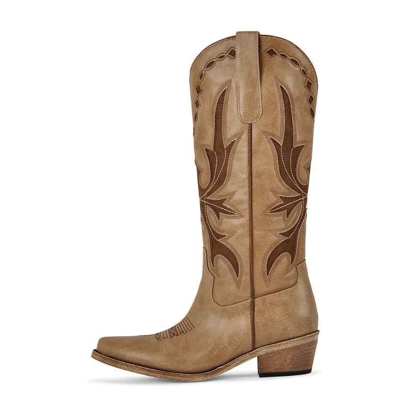 Tan cowboy boot with intricate brown embroidery on a white background