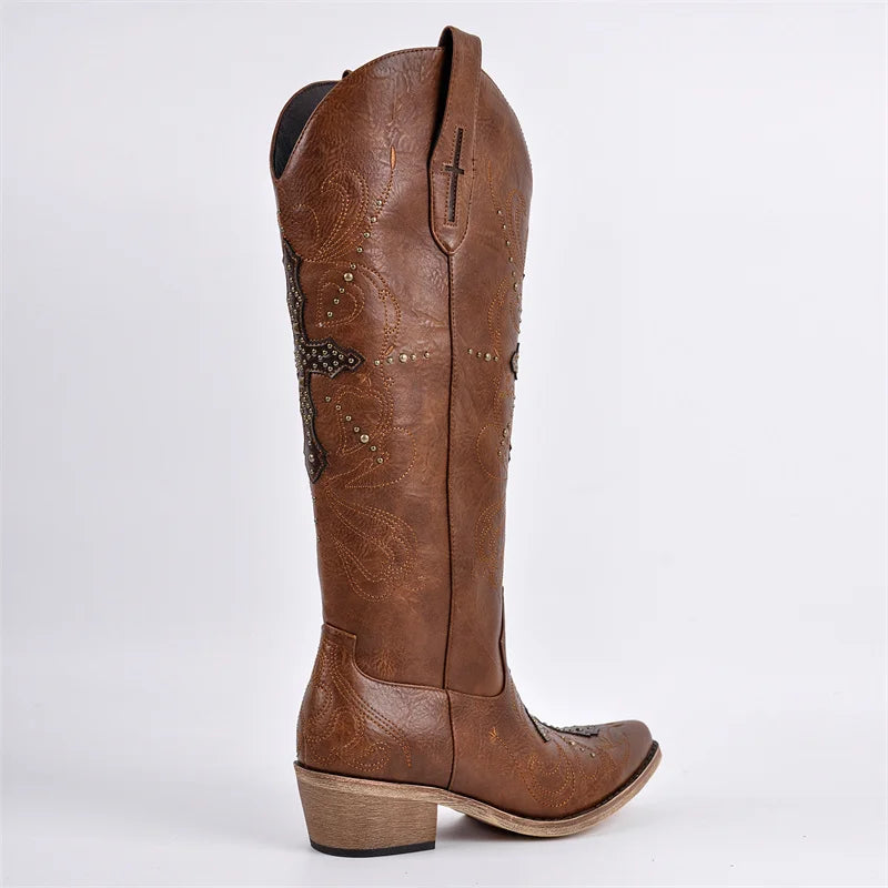 Brown leather boot with decorative patterns on a white background